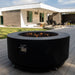 Stonelum Coliseo 01 Concrete Round Fire Pit Noir in Pool Deck by a House