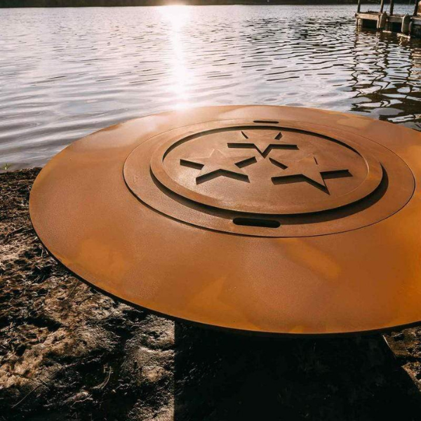 Fire Pit Art Magnum Wood Burning Fire Pit With Steel Lid Cover On The Riverside