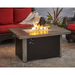 The Outdoor GreatRoom Caden Rectangular Gas Fire Pit Table CAD-1224 With Flame Outdoor Set Up