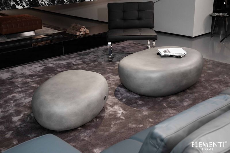 https://cdn.shopify.com/s/files/1/0100/7917/4734/files/Elementi-Home-Hawaii-48-Large-Moon-Grey-Concrete-Pebble-Table-4.jpg?v=1739825853