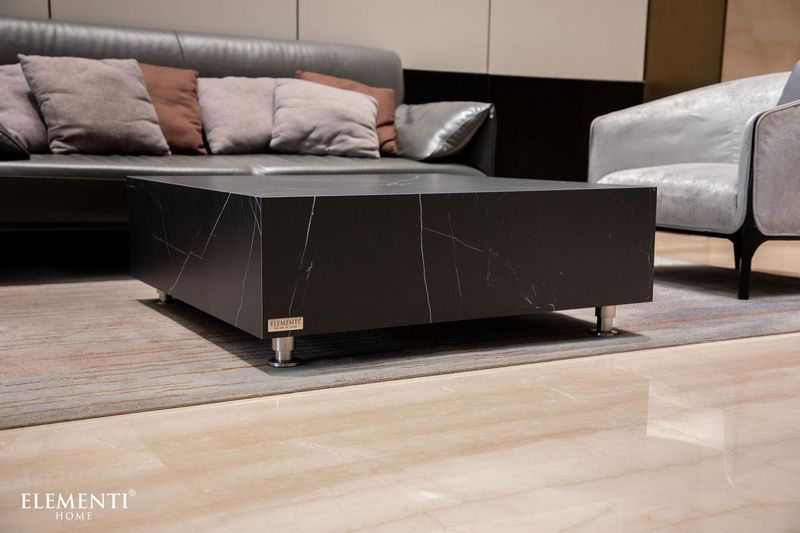 https://cdn.shopify.com/s/files/1/0100/7917/4734/files/Elementi-Home-Sofia-40-Medium-Square-Bulgaria-Black-Marble-Porcelain-Coffee-Table-9.jpg?v=1739827005