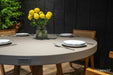 https://cdn.shopify.com/s/files/1/0100/7917/4734/files/Elementi-Home-Verona-48-Round-Space-Grey-Concrete-Dining-Table-7.jpg?v=1739828015