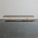 https://cdn.shopify.com/s/files/1/1936/2105/files/starfire-designs-beton-72-inch-rectangle-stainless-steel-burner-cover-demonstration.webp?v=1754331052