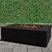 Stonelum Manhattan 04 Rectangular Concrete Fire Pit In Black with Fire on a Patio