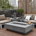 Elementi Hampton Rectangle Concrete Fire Pit Table With Couches And Fruit On The Side View Of A Deck