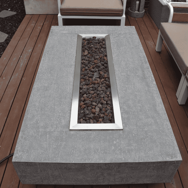 Elementi Hampton Rectangle Concrete Fire Pit Table Without Flame Side View On A Deck