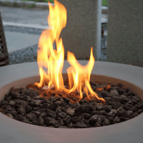 Elementi Lunar Round Concrete Fire Pit Table OFG101 Close Up Photo of Flame, Burner and Lava Rocks