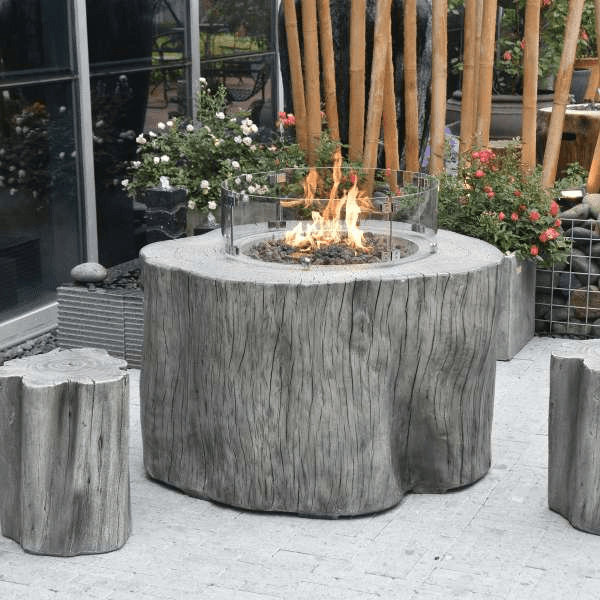 Elementi Warren Table - Propane - OFG307 Classic Gray With Flame, Windscreen and Matching Seats on Outdoor Set Up