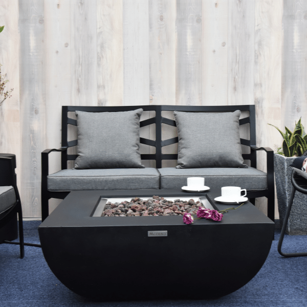Modeno Aurora Black Square Concrete Fire Pit Table OFG114 No Flame on an Outdoor Black and Gray Themed Outdoor Set Up