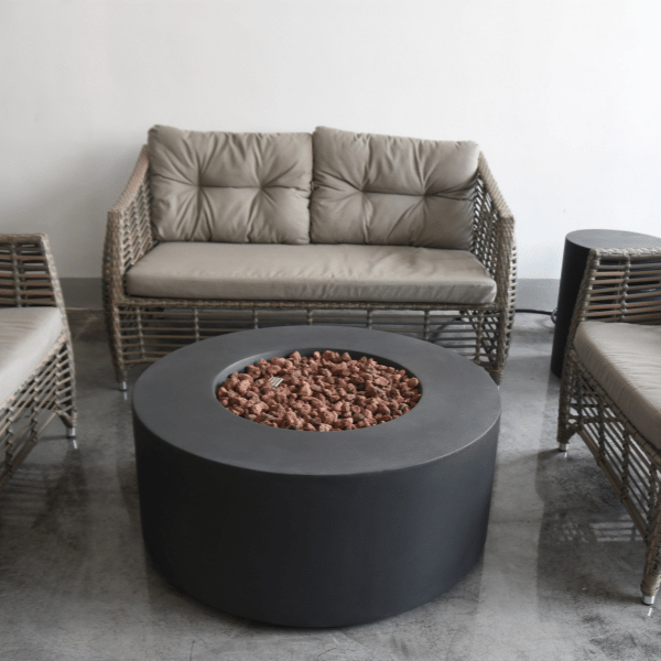 Modeno Venice Round Concrete Fire Pit OFG113 No Flame With Couch on background