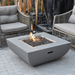 Modeno Westport Square Concrete Fire Pit Table OFG135 With Flame on Backyard Set Up