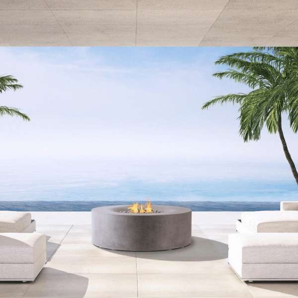 PyroMania Fire Avalon Round Concrete Commercial Fire Pit Table Slate With Flame in Resort Setting