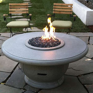 American Fyre Designs Amphora Fire Table In An Outdoor Sample Set Up