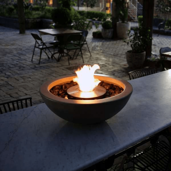    Ecosmart Mix 600 Bioethanol Freestanding Fire Bowl In Graphite Color With Flame In An Outdoor Restaurant