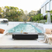 Elementi Plus Valencia Porcelain Top Fire Table OFP102BB With Cover in Pool Side Set-up
