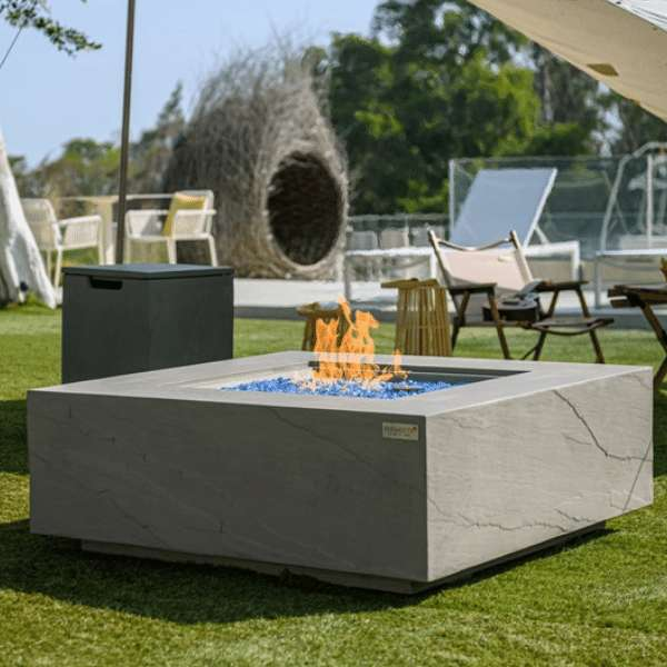 Elementi Plus Capertee Fire Table OFG411SG With Flames and Propane Tank Cover In Pool Side Backyard Set Up