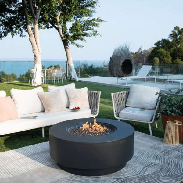 Elementi Plus Nimes Fire Table OFG414DG With Flame In Backyard Set-up