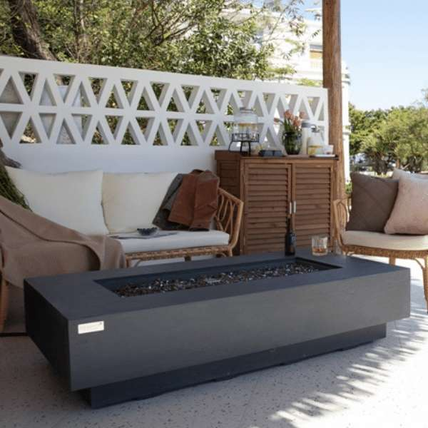 Elementi Plus Positano Fire Table OFG415DG  With Drinks On Top In Backyard Set-up