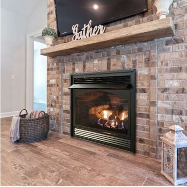 Empire Vail Premium 32 Slope Glaze Burner Vent Free Gas Fireplace In An Indoor Sample Set Up