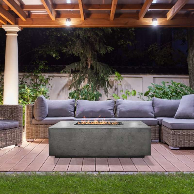 Prism Hardscapes Portos Fire Pit With Hidden Propane Tank In An Outdoor Set Up