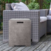 Prism Hardscapes Sausalito Concrete Propane Enclosure In Pewter Beside A Couch