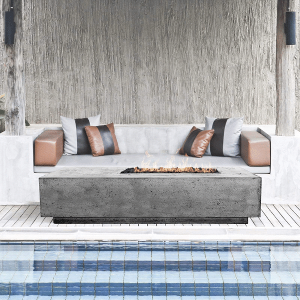 Prism Hardscapes Tavola 5 Concrete Gas Fire Pit In Pewter With Flame On A Pool Side