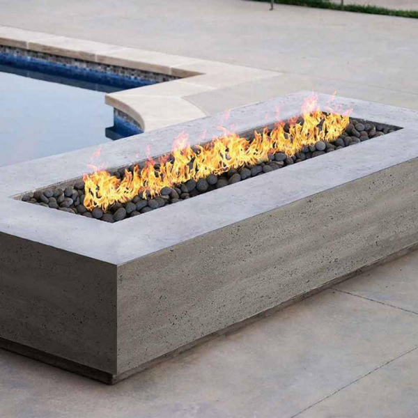    Prism Hardscapes Tavola 6 Concrete Gas Fire Table Ph 415 With Flame On The Center Of Two Womenprism Hardscapes Tavola 6 Concrete Gas Fire Table Ph 415 With Flame On A Pool Side