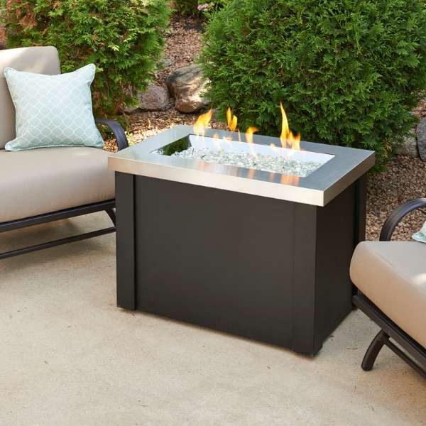 Stainless Steel Providence Rectangular Gas Fire Pit Table With Flame On A Garden Set Up