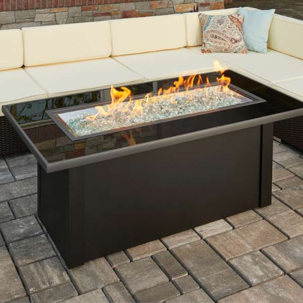 The Outdoor Greatroom Monte Carlo Linear Gas Fire Pit Table With Flame On An Outdoor Set Up