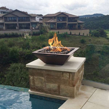     The Outdoor Plus Maya Copper Fire Water Bowl In An Outdoor Swimming Pool Set Up